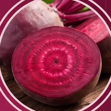 Halved fresh beetroot showing its deep red rings