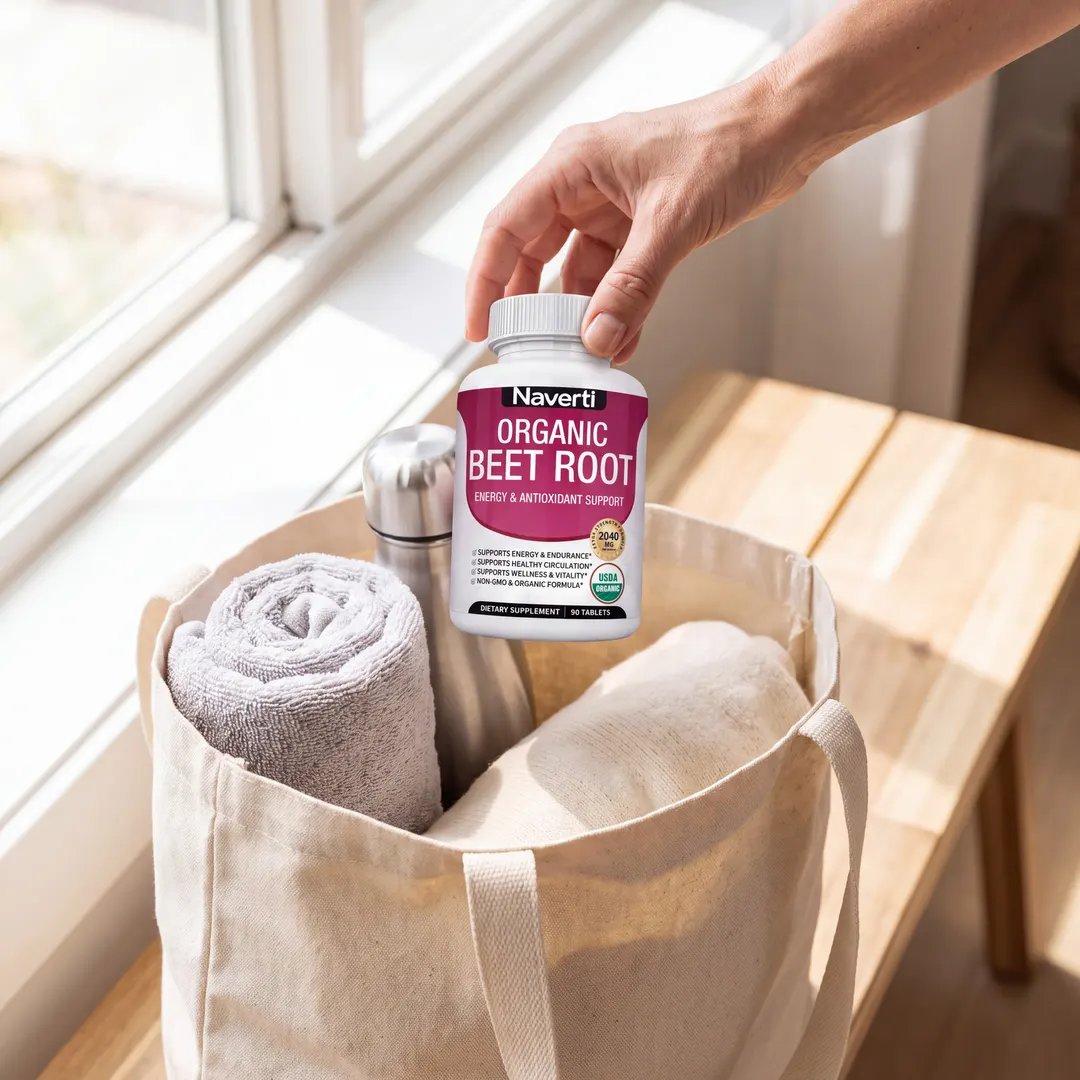 A hand placing a Naverti bottle into a canvas tote